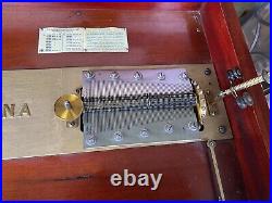 15 1/2 Regina Mahogany Double Comb Disc Music Box With Disc Cabinet