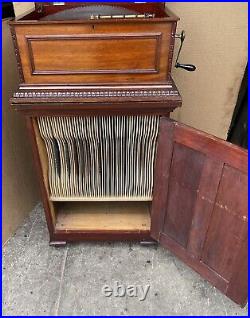 15 1/2 Regina Mahogany Double Comb Disc Music Box With Disc Cabinet