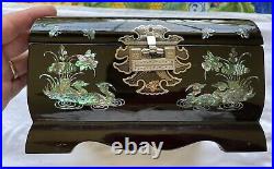 A Korean Jewelry Music Box. Black Laquerware With Mother Of Pearl Peacock inset