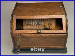 A Victorian Oak Cased Crank Roller Organ