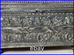 Antique 19th century footed ornate silverplate wood Swiss cylindrical music box Antique 19th century footed ornate silverplate wood Swiss cylindrical music box