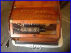 Antique Chautauqua hand crank musical roller organ with 10 songs on cobs