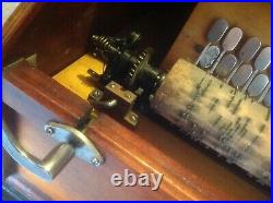 Antique Chautauqua hand crank musical roller organ with 10 songs on cobs