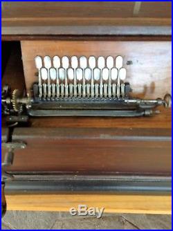 Antique Organette And 21 Cylinders