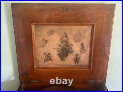 Antique Regina music box with12 music discs