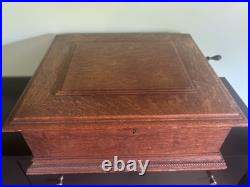 Antique Regina music box with12 music discs