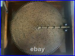 Antique Regina music box with12 music discs
