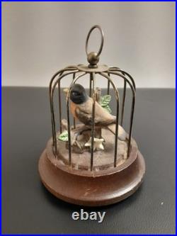 Antique singing bird in a cage, a mechanical music box Working Tested
