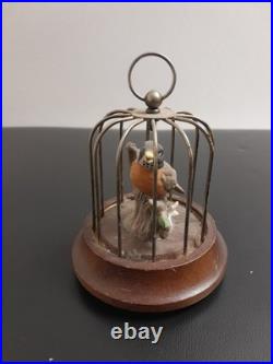 Antique singing bird in a cage, a mechanical music box Working Tested
