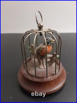 Antique singing bird in a cage, a mechanical music box Working Tested