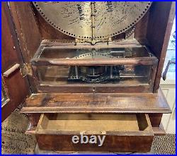 Beautiful Antique Polyphon Upright Coin Disc Music Box. 19 Discs & 59 Coins
