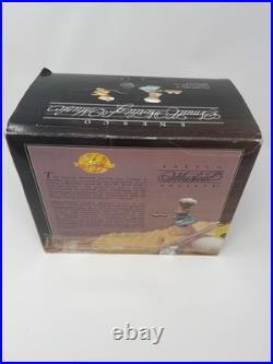 C. 1992 Enesco Home On The Range Deluxe Illuminated Action Musical