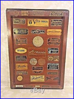 Collectors Dream A Victrola Top with Tags from Various Makers of Phonographs