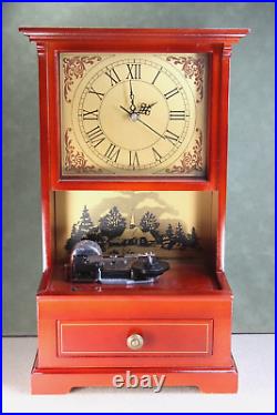 Dillard's Mr. Christmas Clock Symphonium Music Box Plays on the Hour, 10 Discs