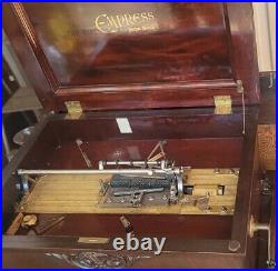 Empress Parlor Grand 15 and 14 disc Console Music Box with Cabinet 1897