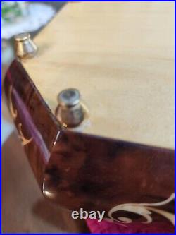 Italian inlaid wood jewelry box/music box. Lacquered. Lg 15 x 9 d x 4 tall