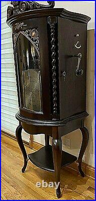 Mahogany 15-1/2 Regina Home Model Curved Front Changer Upright Disc Music Box
