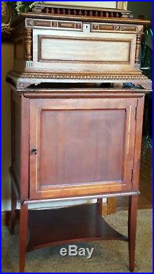 Regina 15.5 Music Box with 27 Discs Cupola style lid, Carved Cabinet Works Great