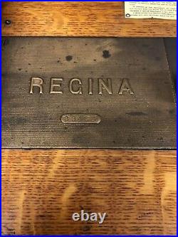 Regina Double Comb Oak Cabinet Music Box With 5 15 1/2 Inch Discs