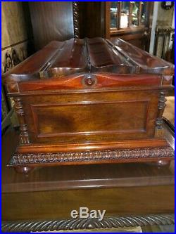 Regina Music Box model #6 in mahogany, plays 27 discs, restored condition