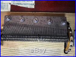 Regina Single Comb Music Box with 15 Discs and Cabinet