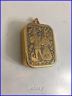 Reuge Ste Croix miniature music box pendant