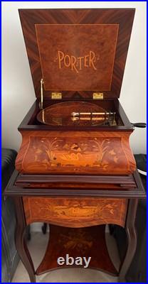 Swan Porter music box with matching cabinet, multiple discs. Meticulously loved