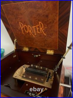 Swan Porter music box with matching cabinet, multiple discs. Meticulously loved