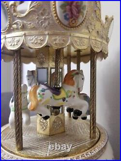 The San Francisco Music Box Company 4 Horse Rotating Carousel Porcelain