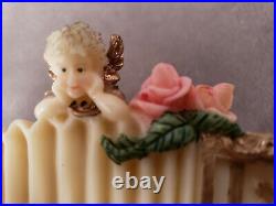 Vintage Rare Music box with angels and roses on an accordian. Kingstate corp