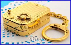 Vintage Signed Reuge Ste Croix Music Box Key chain Gold Plated