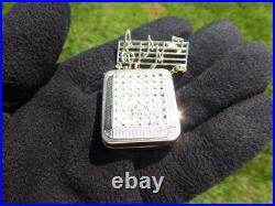 Vintage Swiss Reuge Miniature Music Box Gold Tone Case Musical Brooch