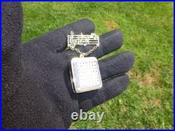 Vintage Swiss Reuge Miniature Music Box Gold Tone Case Musical Brooch