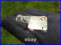 Vintage Swiss Reuge Miniature Music Box Gold Tone Case Musical Brooch