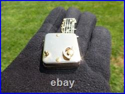 Vintage Swiss Reuge Miniature Music Box Gold Tone Case Musical Brooch
