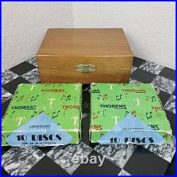 Vintage Thorens wooden music box player with 21 metal discs, made in Switzerland