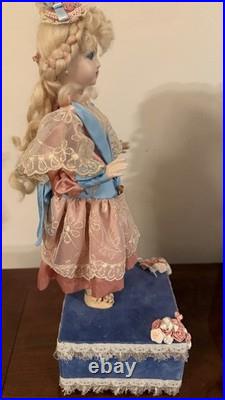 Vintage automated sankyo music box doll in working order