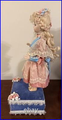 Vintage automated sankyo music box doll in working order