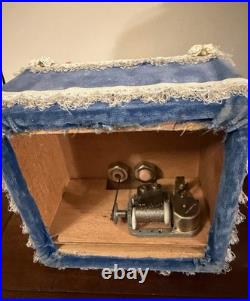 Vintage automated sankyo music box doll in working order