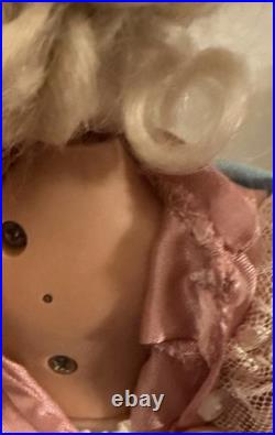 Vintage automated sankyo music box doll in working order