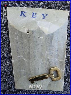Vintage key & advertising key holder for Thorens Imported Swiss Musical Movement